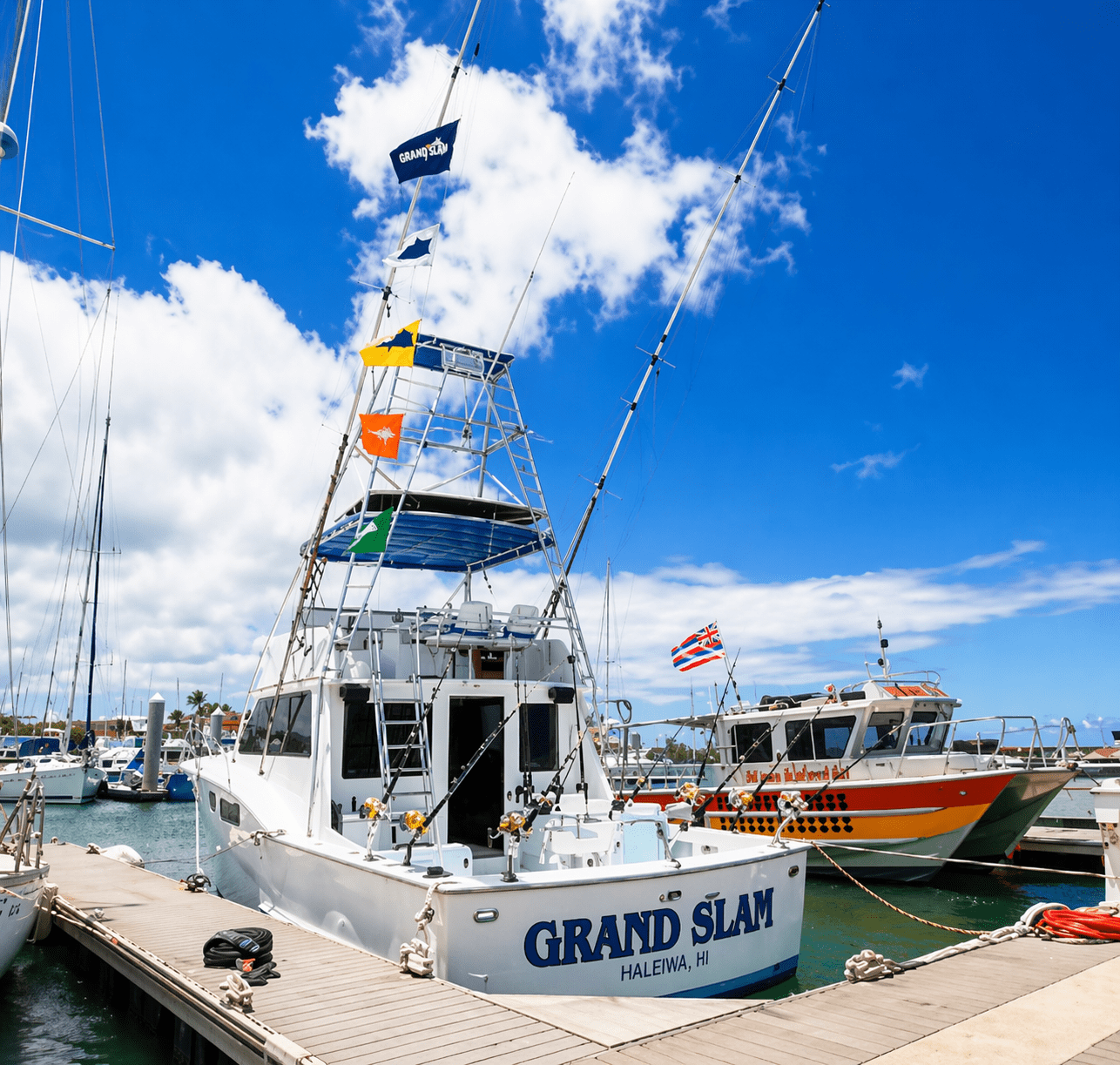 Grand Slam" boat moored at marina
