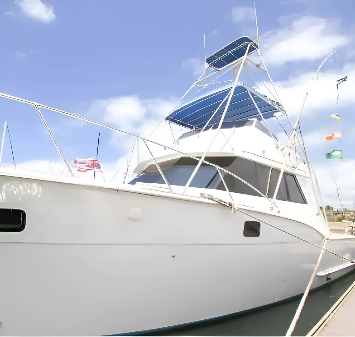 Yacht with flags on a sunny day
