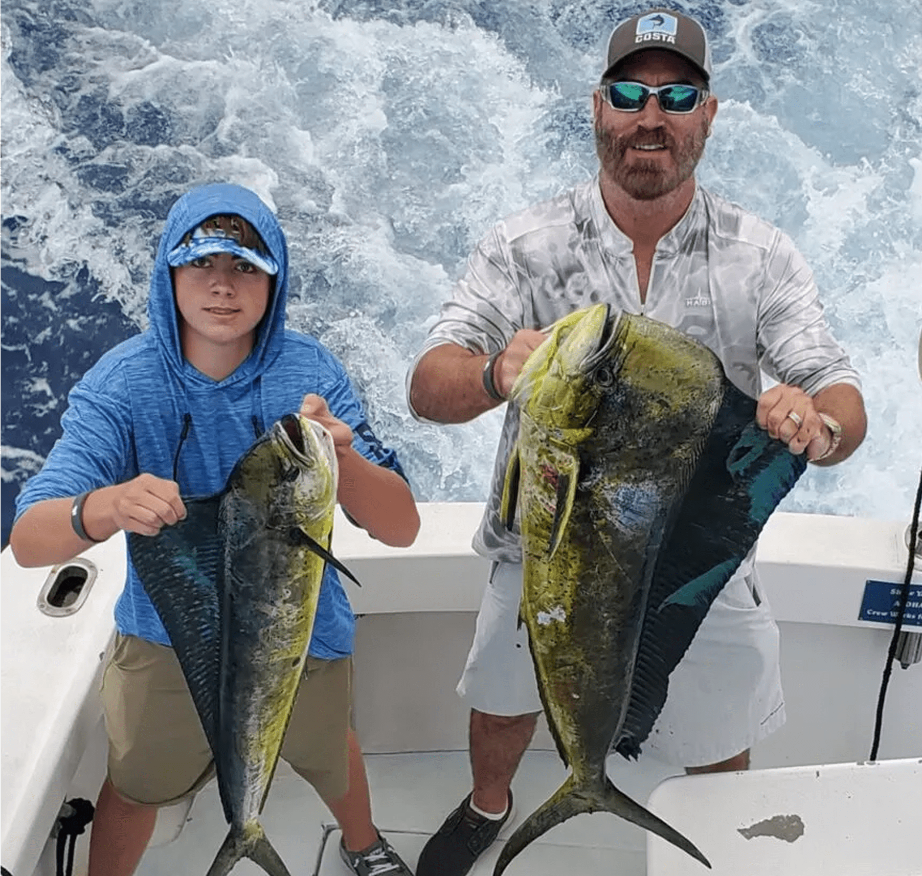 Father and son with fresh catches.